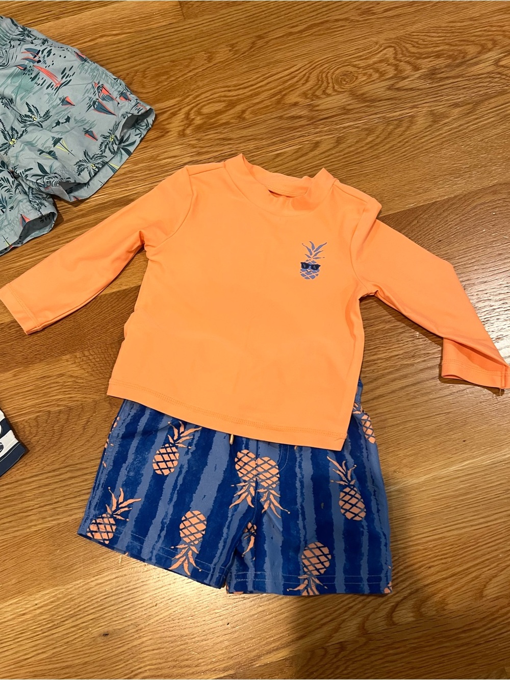 Carter's Orange Rash Guard & Blue Pineapple Swim Shorts